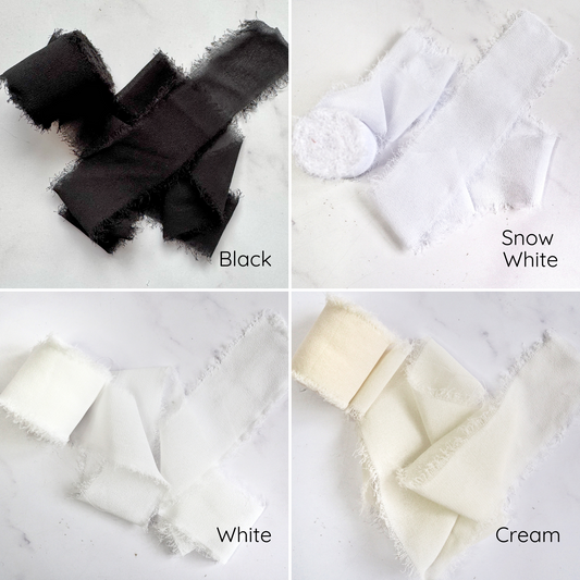 An assortment of chiffon ribbons in various colors displayed on a light background.