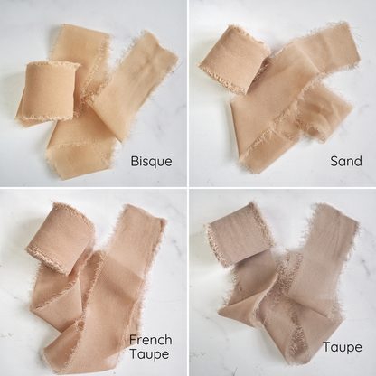 An assortment of chiffon ribbons in various colors displayed on a light background.