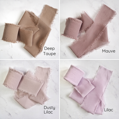An assortment of chiffon ribbons in various colors displayed on a light background.